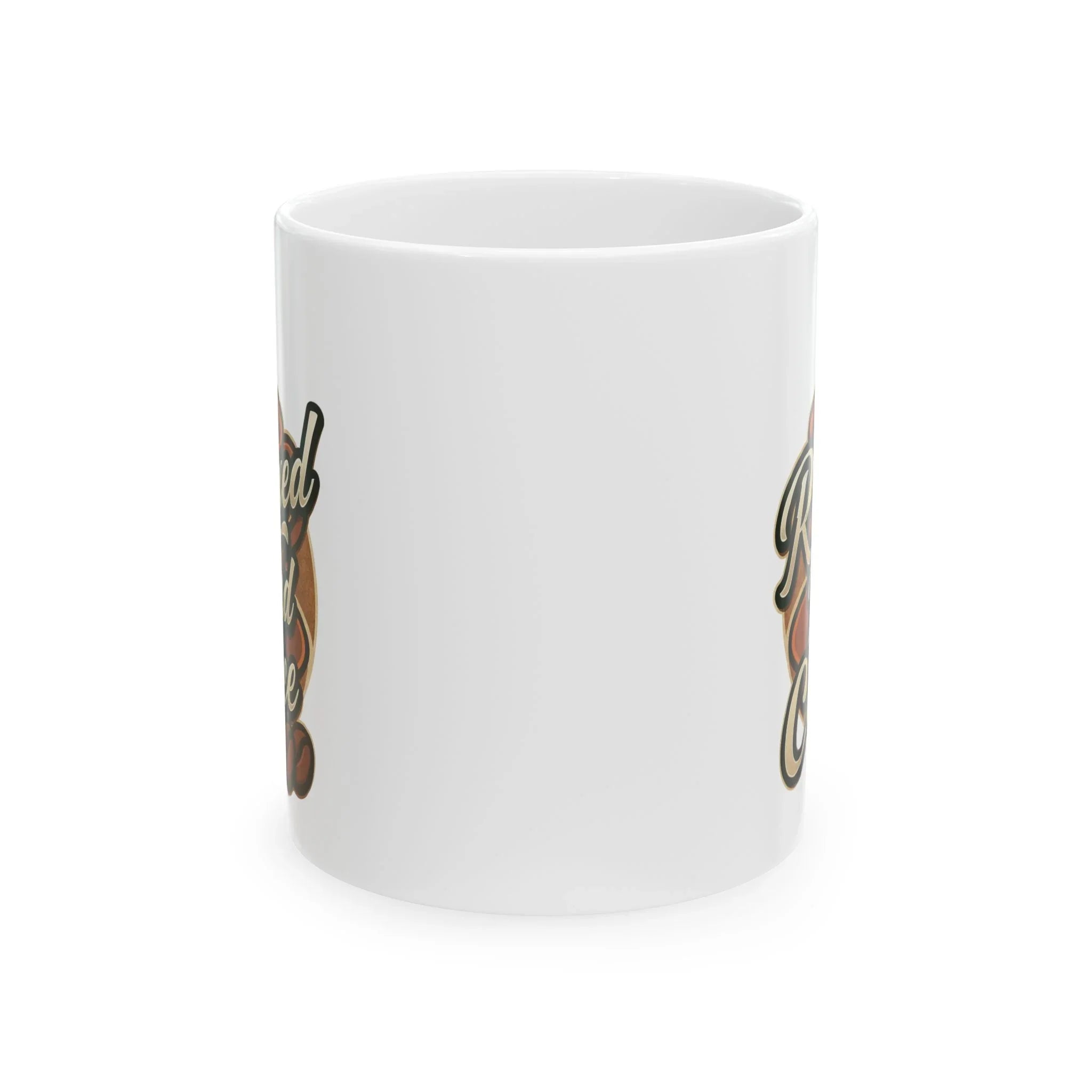 White ceramic coffee mug with brown coffee bean design and black text partially visible